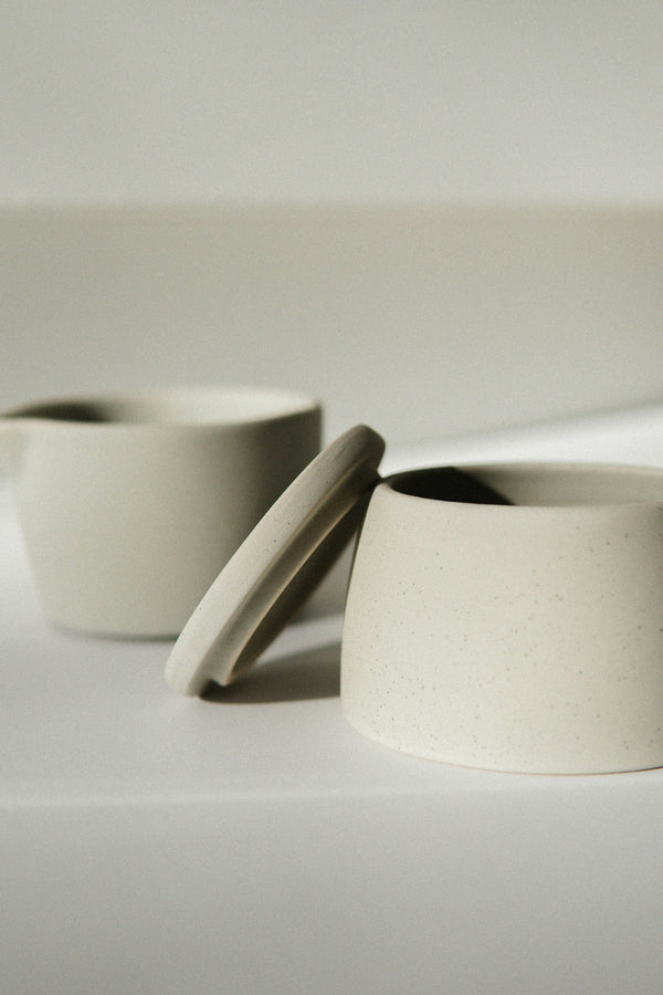 Stoneware lidded mugs, pair