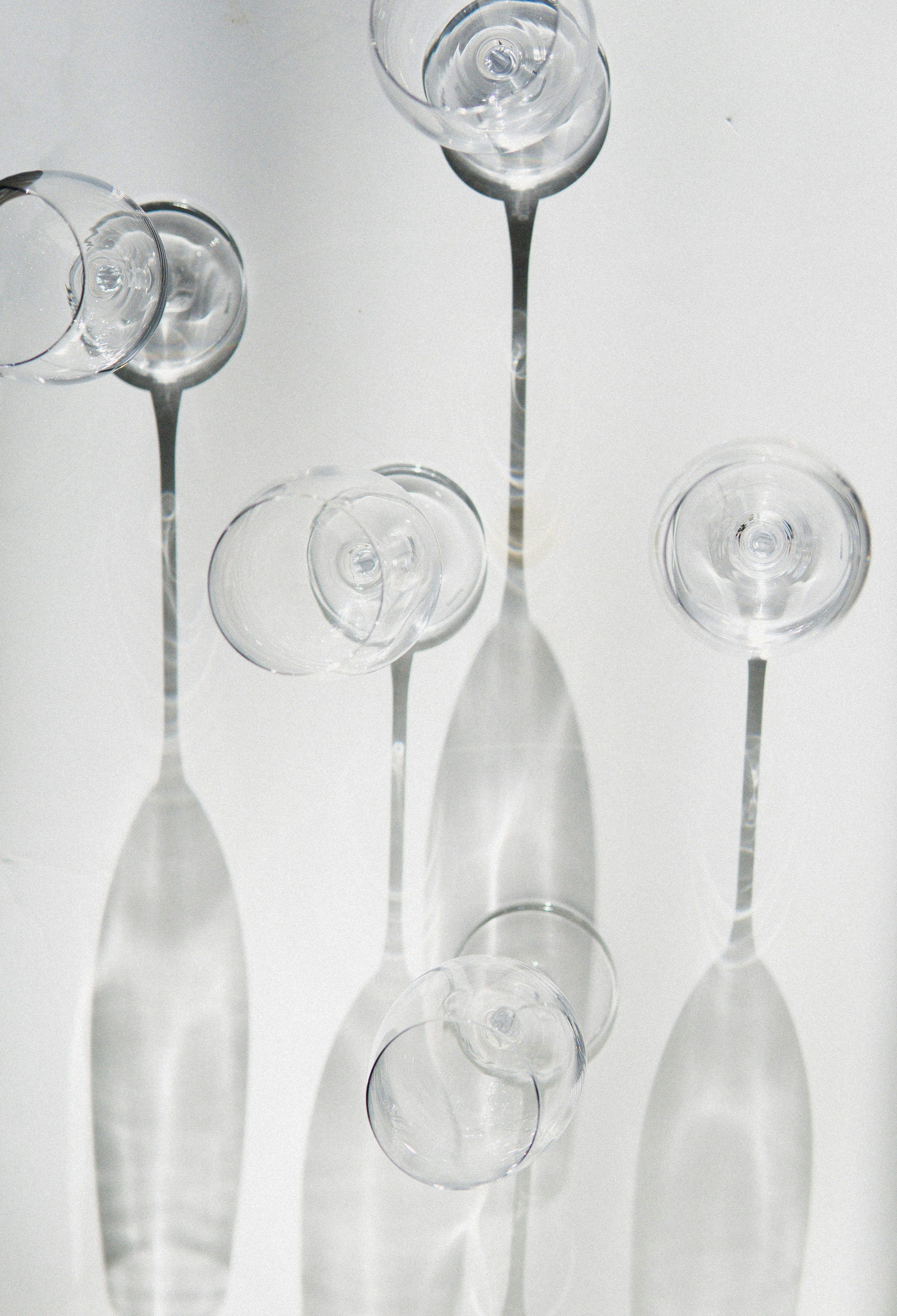 Set of four long-stemmed clear crystal wine glasses
